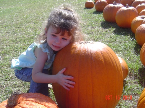 Okay, so she likes to hug pumpkins...