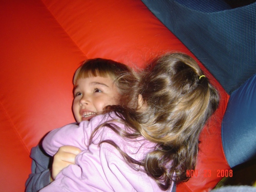 The girls had such a great time jumping all over Michael in their bouncey house.